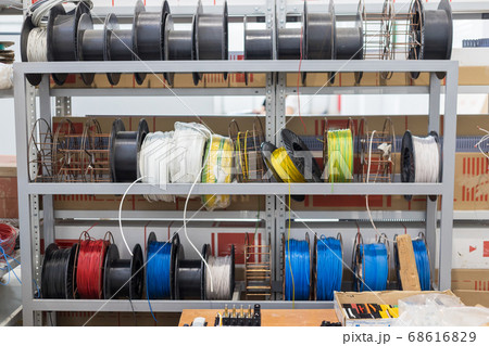Making an electricity panel board - rack with coils of wire Making an electricity panel board - rack with coils of wire 68616829
