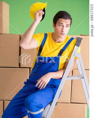 Man contractor working with boxes delivery Man contractor working with boxes delivery 68617325