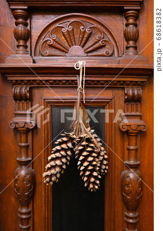 Big bumps hang on the front door of the house. Big bumps hang on the front door of the house. 68618382
