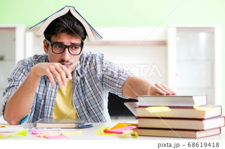 Student preparing for university exams with many conflicting pri Student preparing for university exams with many conflicting pri 68619418