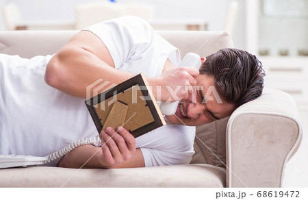 Young man unhappy in broken love concept Young man unhappy in broken love concept 68619472