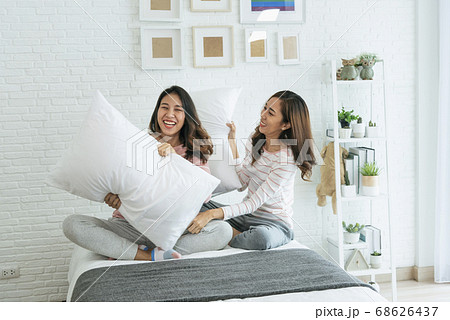 Lesbian couple homosexual happiness lifestyle on bed. Two pretty girlfriend talk Lesbian couple homosexual happiness lifestyle on bed. Two pretty girlfriend talk 68626437
