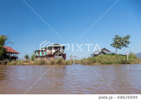 Floating village houses along Inle Lake in Burma Floating village houses along Inle Lake in Burma 68626999