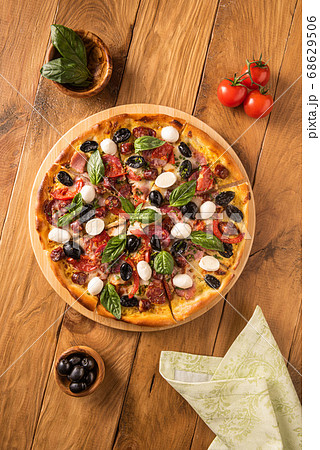 Flat lay with pizza and its ingredients Flat lay with pizza and its ingredients 68629506