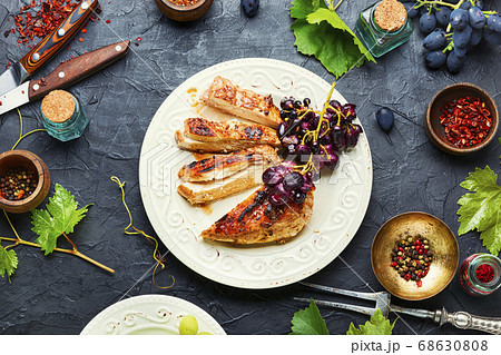 Sliced chicken breast with spices 68630808