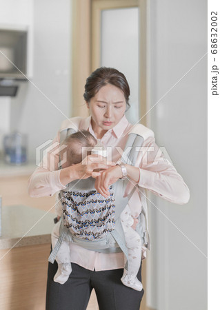 Modern young family concept, young mother and father with newborn 307 68632002