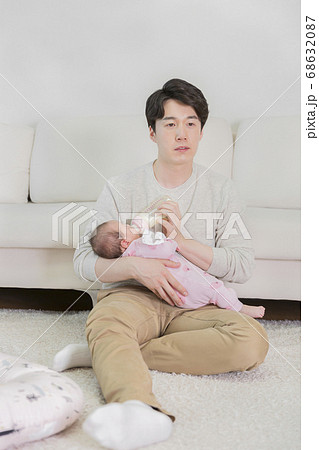 Modern young family concept, young mother and father with newborn 504 68632087