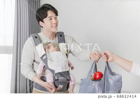 Modern young family concept, young mother and father with newborn 409 Modern young family concept, young mother and father with newborn 409 68632414
