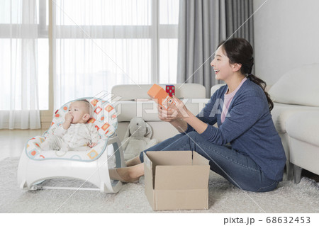 Modern young family concept, young mother and father with newborn 196 Modern young family concept, young mother and father with newborn 196 68632453