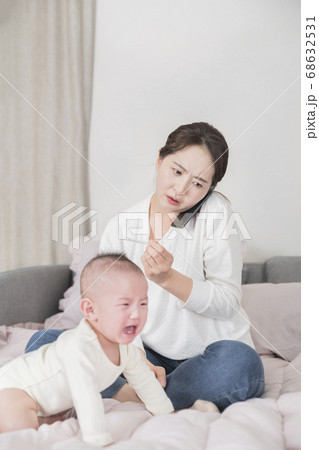 Modern young family concept, young mother and father with newborn 284 68632531