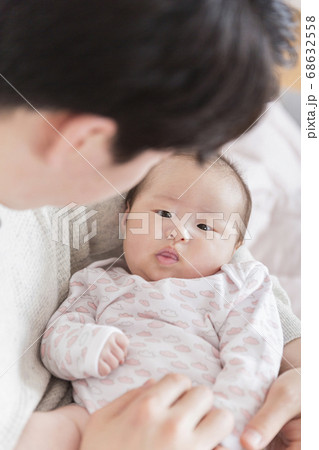 Modern young family concept, young mother and father with newborn 366 68632558