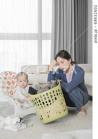 Modern young family concept, young mother and father with newborn 323 68632602