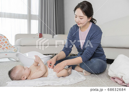 Modern young family concept, young mother and father with newborn 214 Modern young family concept, young mother and father with newborn 214 68632684