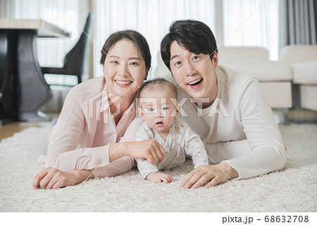 Modern young family concept, young mother and father with newborn 128 68632708