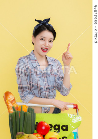 Life style concept, happy shopping time. Young asian woman with shopping bags and cart. 502 68632946