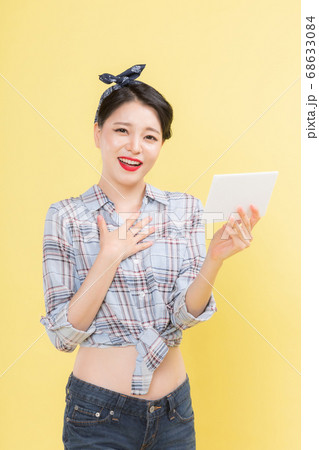 Life style concept, happy shopping time. Young asian woman with shopping bags and cart. 403 Life style concept, happy shopping time. Young asian woman with shopping bags and cart. 403 68633084