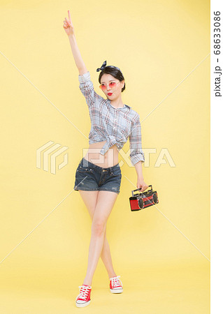 Life style concept, happy shopping time. Young asian woman with shopping bags and cart. 411 68633086