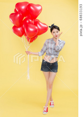 Life style concept, happy shopping time. Young asian woman with shopping bags and cart. 353 68633193