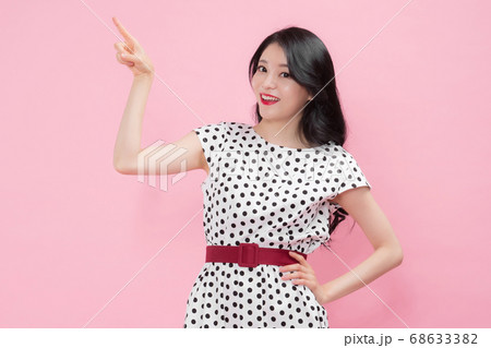 Life style concept, happy shopping time. Young asian woman with shopping bags and cart. 107 Life style concept, happy shopping time. Young asian woman with shopping bags and cart. 107 68633382