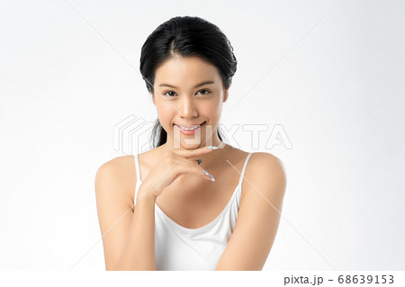 Beautiful Young asian Woman with Clean Fresh Skin, on white background, Face care, Facial treatment. Beautiful Young asian Woman with Clean Fresh Skin, on white background, Face care, Facial treatment. 68639153