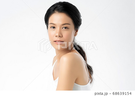 Beautiful Young asian Woman with Clean Fresh Skin, on white background, Face care, Facial treatment. Beautiful Young asian Woman with Clean Fresh Skin, on white background, Face care, Facial treatment. 68639154
