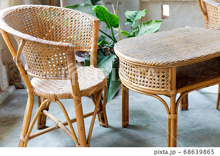 Image of Interior decorative for living area with rattan armchair and plants 68639865