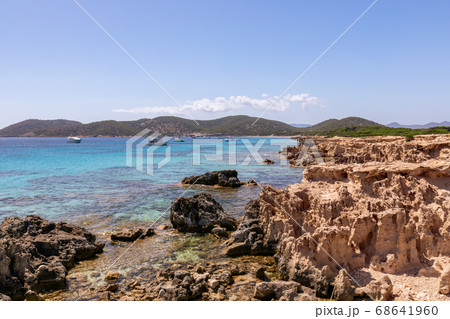 View of the beautiful rocky coast of the island Ibiza. Balearic Islands, Spain View of the beautiful rocky coast of the island Ibiza. Balearic Islands, Spain 68641960