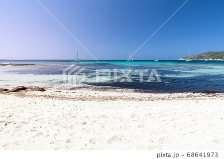 Finest white sand on one of the most beautiful beaches Ses Salines in Ibiza island Finest white sand on one of the most beautiful beaches Ses Salines in Ibiza island 68641973