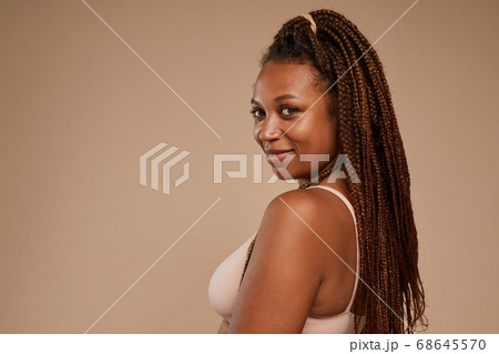 African woman with beautiful hairstyle 68645570