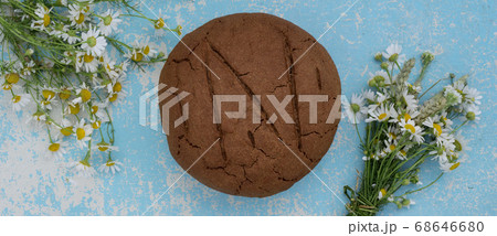 loaf of fresh baked artisan rye and whole grain loaf of fresh baked artisan rye and whole grain 68646680