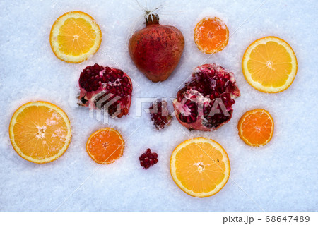 Fresh mixed fruit on snow 68647489