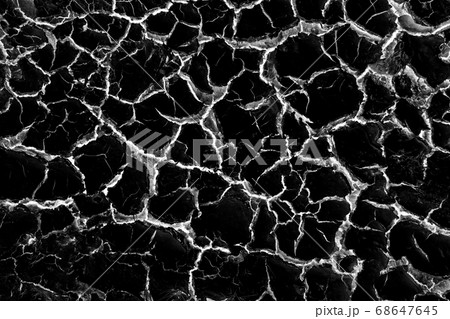 Cracked earth, metaphoric for climate change and global warming 68647645