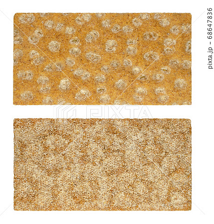 Rye crispbread from the front and back side, close-up from above. Rectangle shaped flat and dry cracker made of rye flour. Light bread. Keeps fresh a long time. Staple food. Isolated over white. Photo Rye crispbread from the front and back side, close-up from above. Rectangle shaped flat and dry cracker made of rye flour. Light bread. Keeps fresh a long time. Staple food. Isolated over white. Photo 68647836