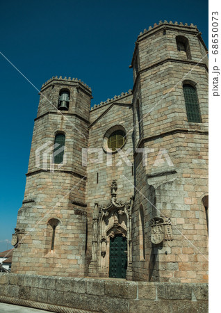 Gothic facade with steeples at the Guarda Cathedral 68650073