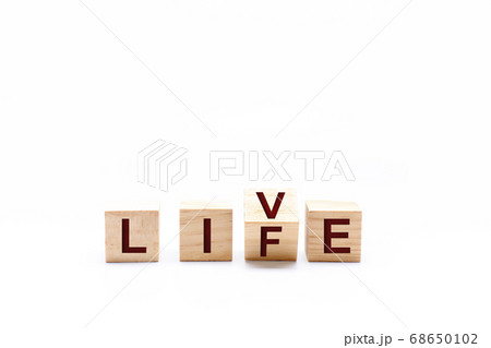 Spinning wooden dice by changing the word LIFE to Spinning wooden dice by changing the word LIFE to 68650102