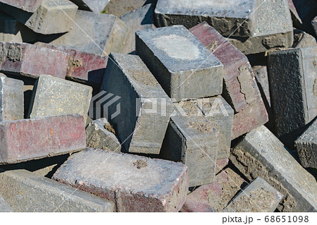 Disassembled building bricks stacked in a large pile close up Disassembled building bricks stacked in a large pile close up 68651098