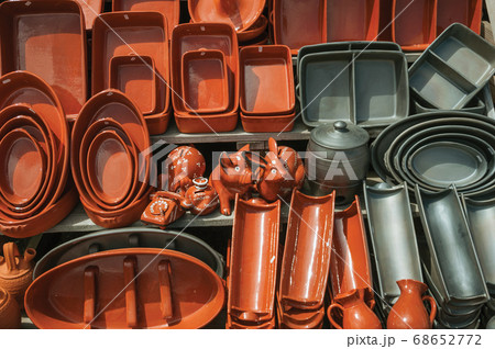 Earthenware crockery handmade from varnished baked clay Earthenware crockery handmade from varnished baked clay 68652772