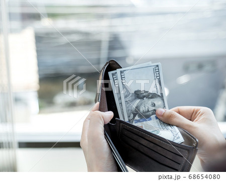 women person hands open the wallet and take purse dollar note out of women person hands open the wallet and take purse dollar note out of 68654080