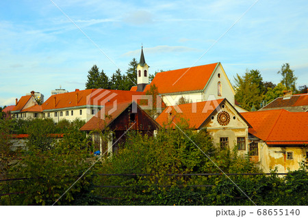Red roofs of houses of the old city during sunset. Red roofs of houses of the old city during sunset. 68655140