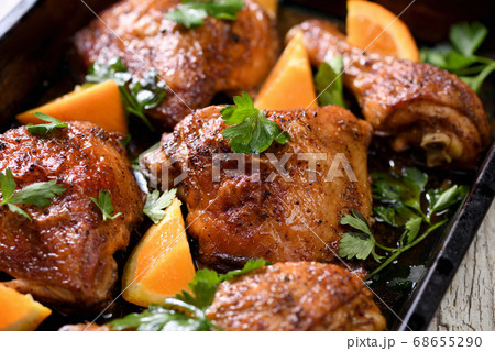 Fried chicken with oranges 68655290