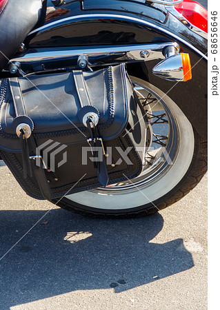 Leather biker bag on a motorcycle close-up. Leather biker bag on a motorcycle close-up. 68656646