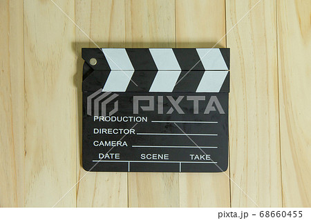 movie slate on wood for movie content. movie slate on wood for movie content. 68660455