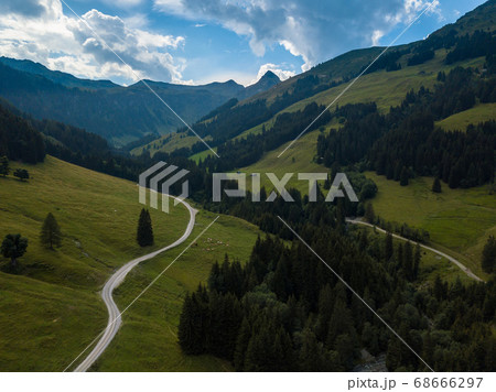 Aerial view into the valley head of the Hinterglemm Mountains on a summer day in the Alps at Saalbach-Hinterglemm, Austria 68666297