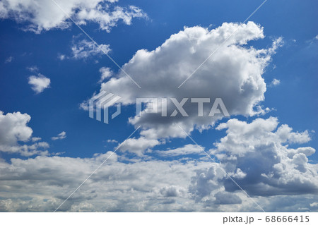Rain cloud formation in the blue sky 68666415