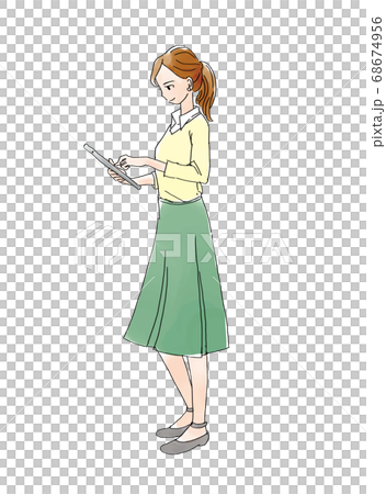 A woman operating a tablet A woman operating a tablet 68674956