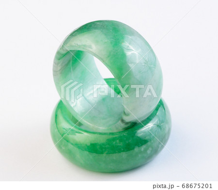 Group of green jade ring on white background 68675201