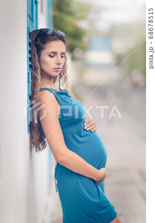 Outdoor portrait of a pregnant woman 68678515