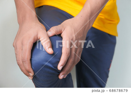 Close up on man suffering knee joint pain 68678679