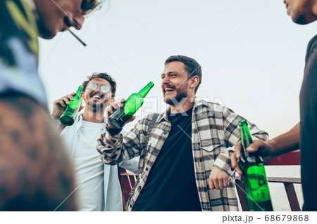 Group of friends celebrating, resting, having fun and party in summer day Group of friends celebrating, resting, having fun and party in summer day 68679868