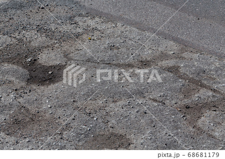 asphalt damaged road 68681179